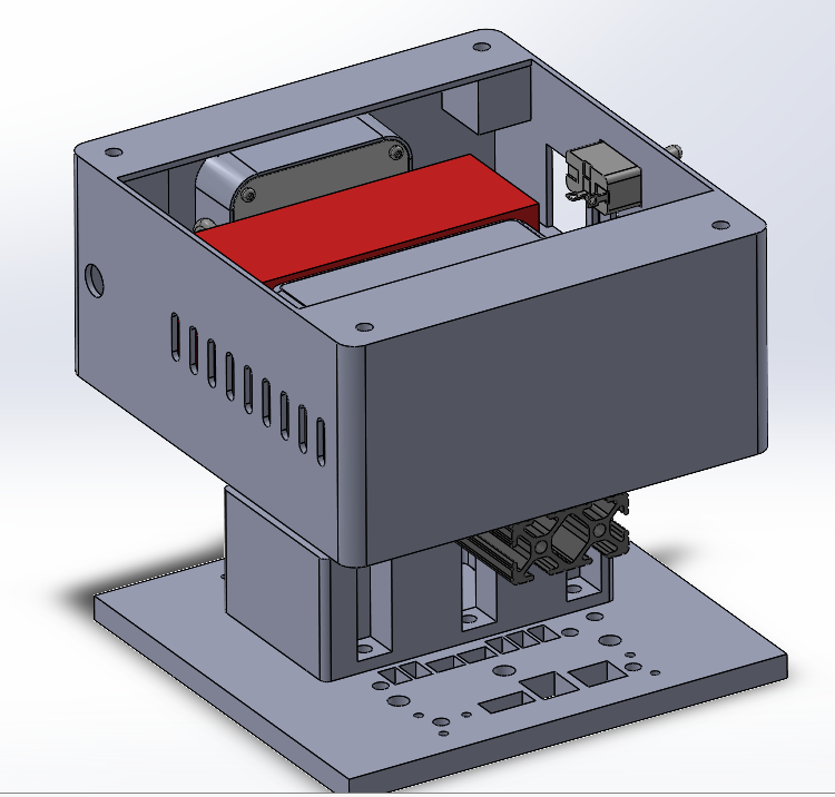 The final sensor box without its lid, showing the internal electronics bay and cooling vents along the sides